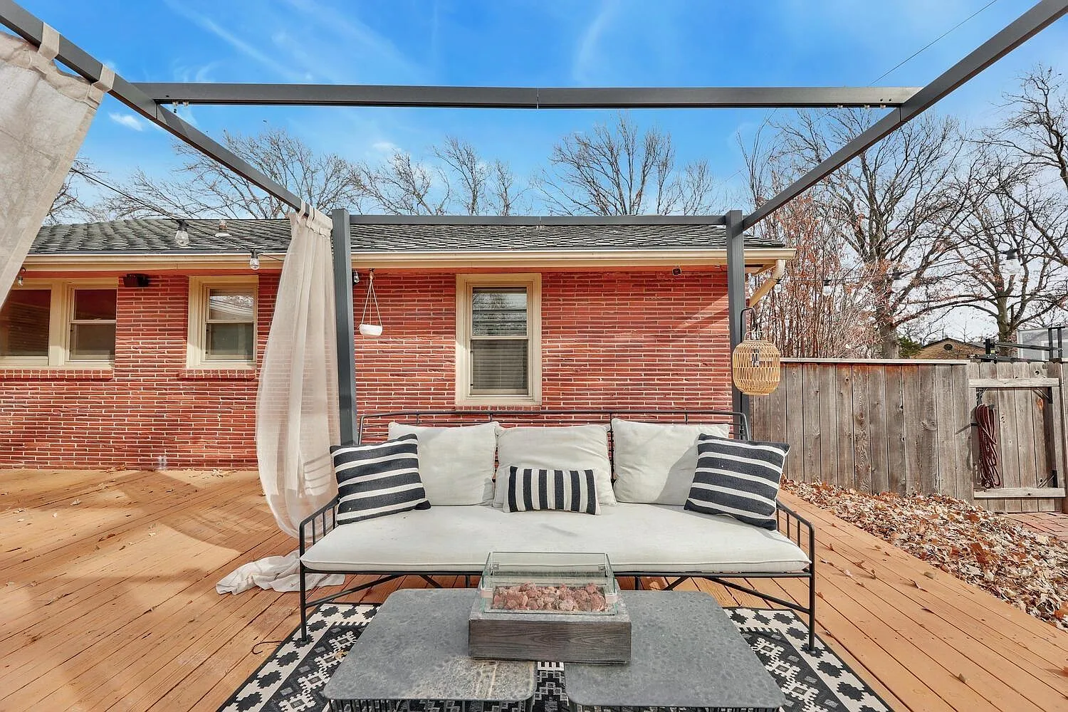 Peaceful backyard space at Graceful Living with outdoor seating area