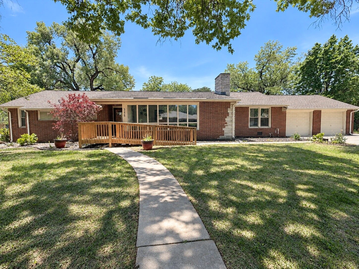 Graceful Living's brick home in Wichita on a sunny day
